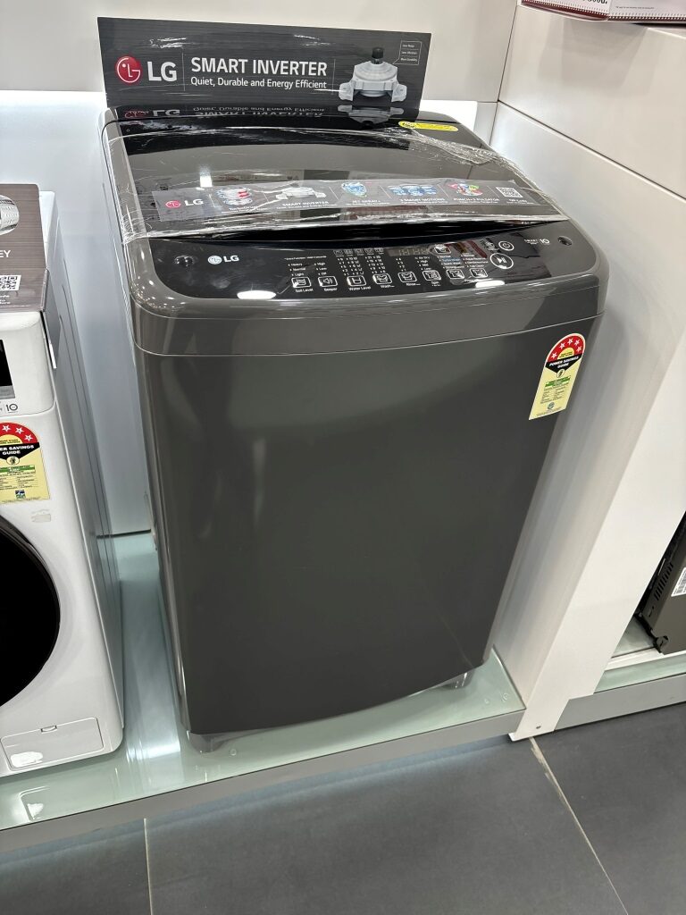 LG 7 Kg Top Load Washing Machine Appliance (T70SJSF2ZA) image captured while testing in a store