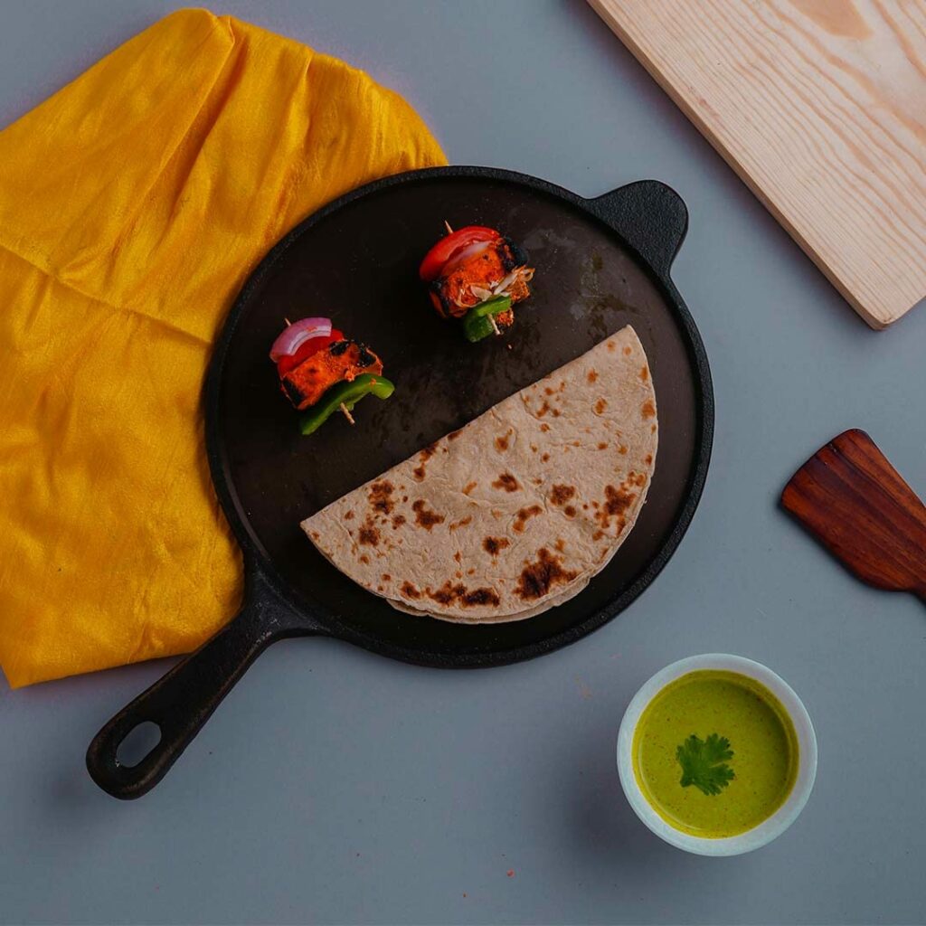 The Indus Valley Super Smooth Cast Iron Tawa with long handle