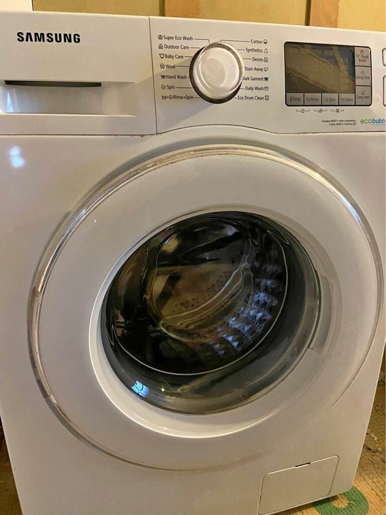 Washing a single lightweight white bed sheet in a Samsung washing machine