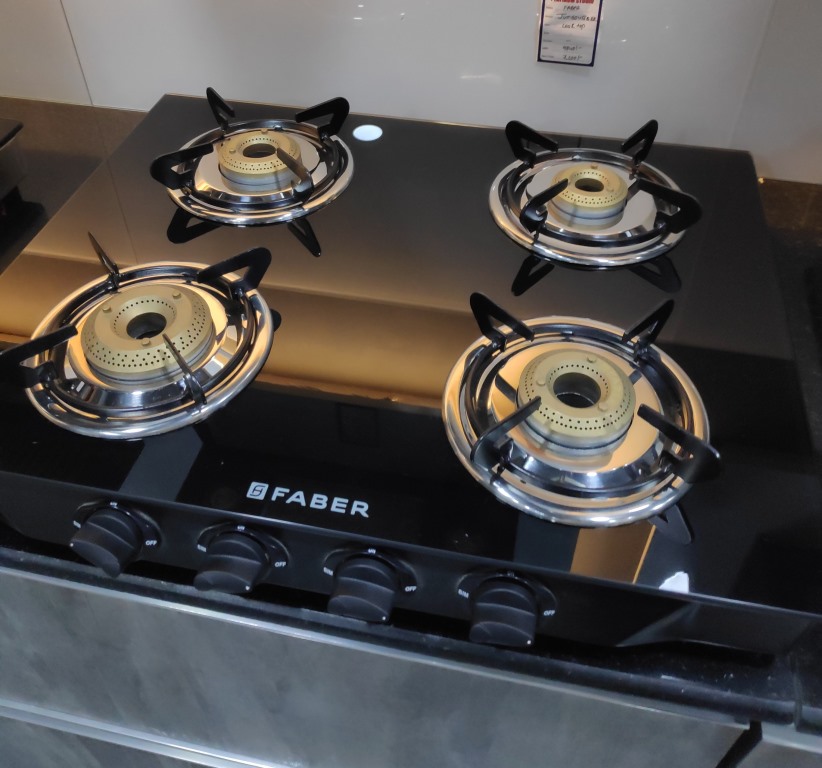 Faber 4 Burner Glass Cooktop Power 4BB BK Manual Ignition Gas Stove installed in a kitchen