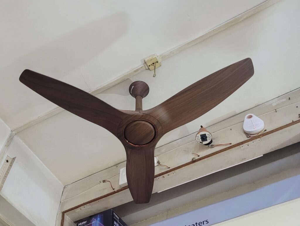 Havells 1200mm Stealth Wood Ceiling Fan mounted in ceiling