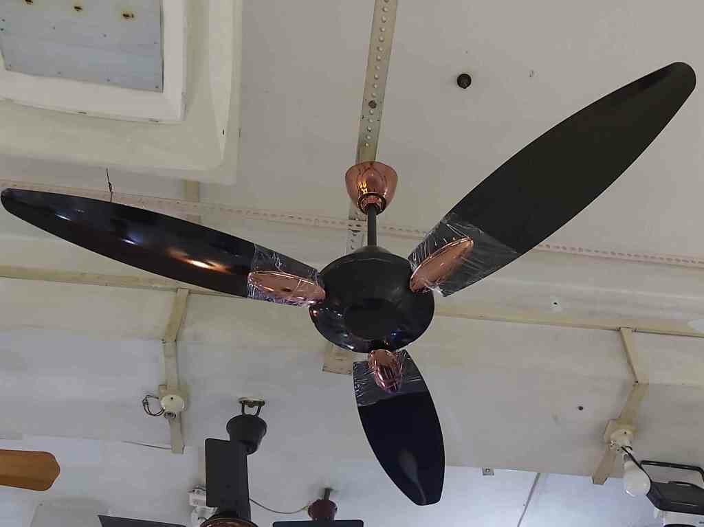 Usha Bloom Daffodil Goodbye Dust Ceiling Fan 1250mm installed in a ceiling