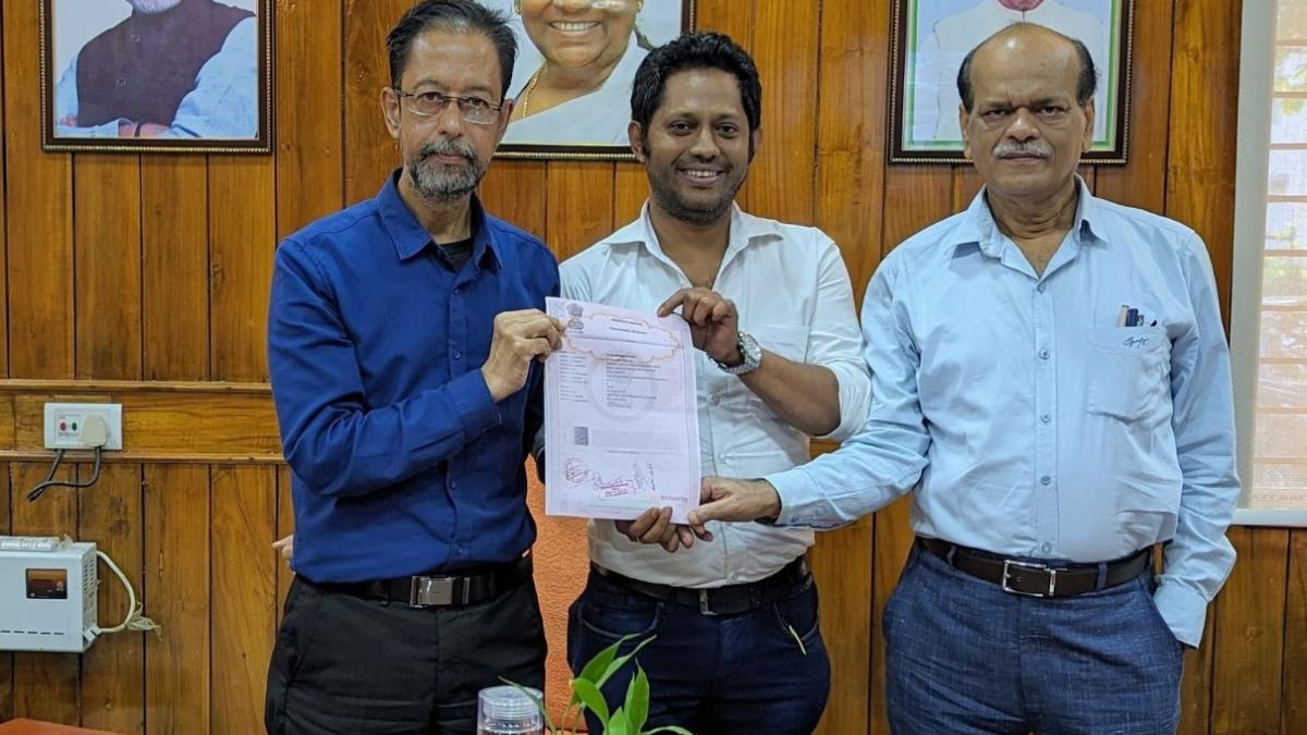 Dr Alok Nath receiving offer letter from Silchar SMCH Principal